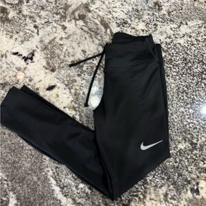 Nike Kids Black Leggings with Silver Swoosh